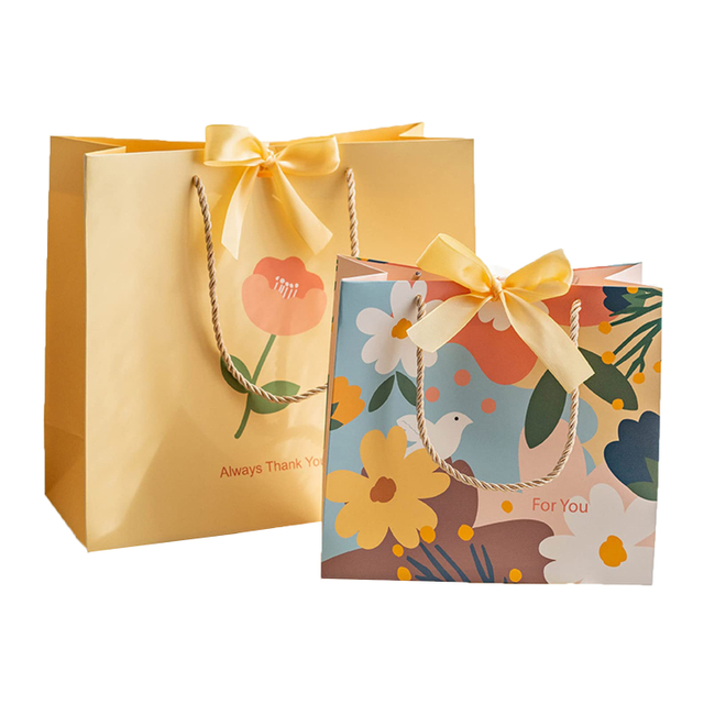 La aduana imprimió bolsos florales de lujo de la bolsa de papel de las compras de la cartulina de las bolsas de papel para la pequeña empresa