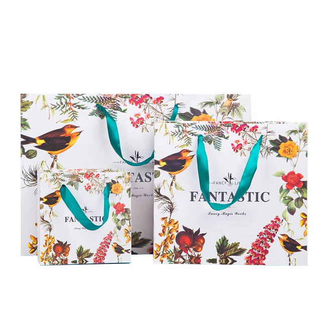 Bolsos coloridos de Kraft de la bolsa de papel de empaquetado de la flor del tablero de tarjeta reciclable del logotipo de la impresión personalizada con la manija