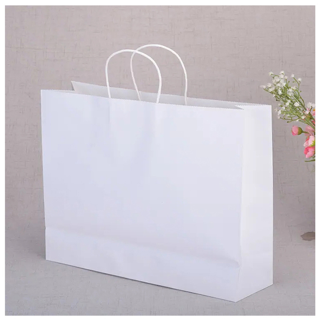Bolsas de papel de compras negras de lujo reciclables, venta al por mayor, logotipo impreso personalizado para ropa, embalaje de cosméticos, bolsas de regalo